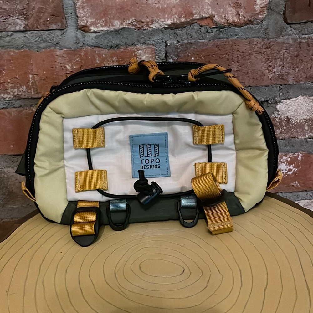 Topo Designs multi-color utility sling bag - cream, yellow, green, blue